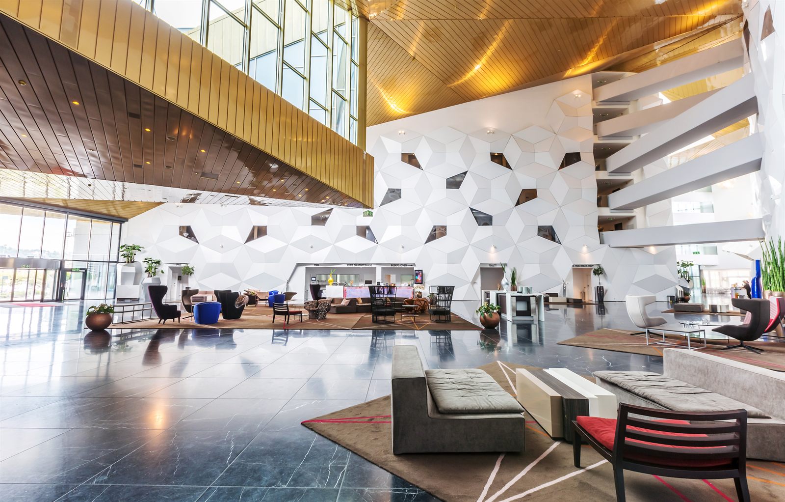 Bright, modern lobby with sculptural walls